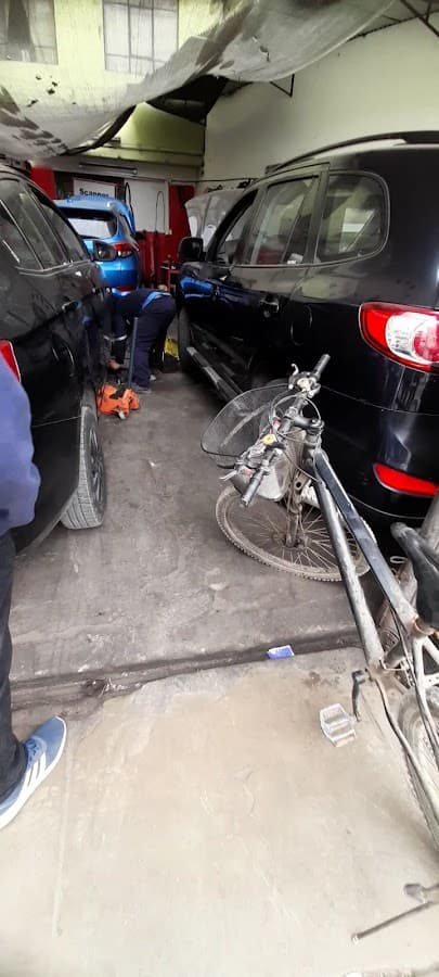 Ogosi - Taller Automotriz — foto
