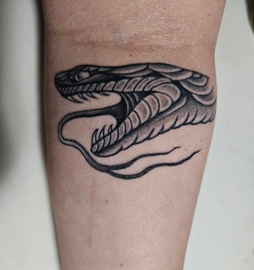 8th Day Tattoo — foto